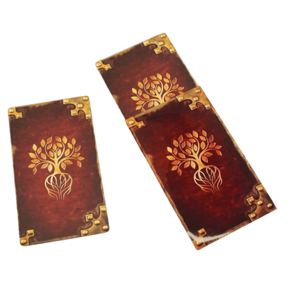 Three dark red cards with golden tree designs and ornate corners, two stacked.