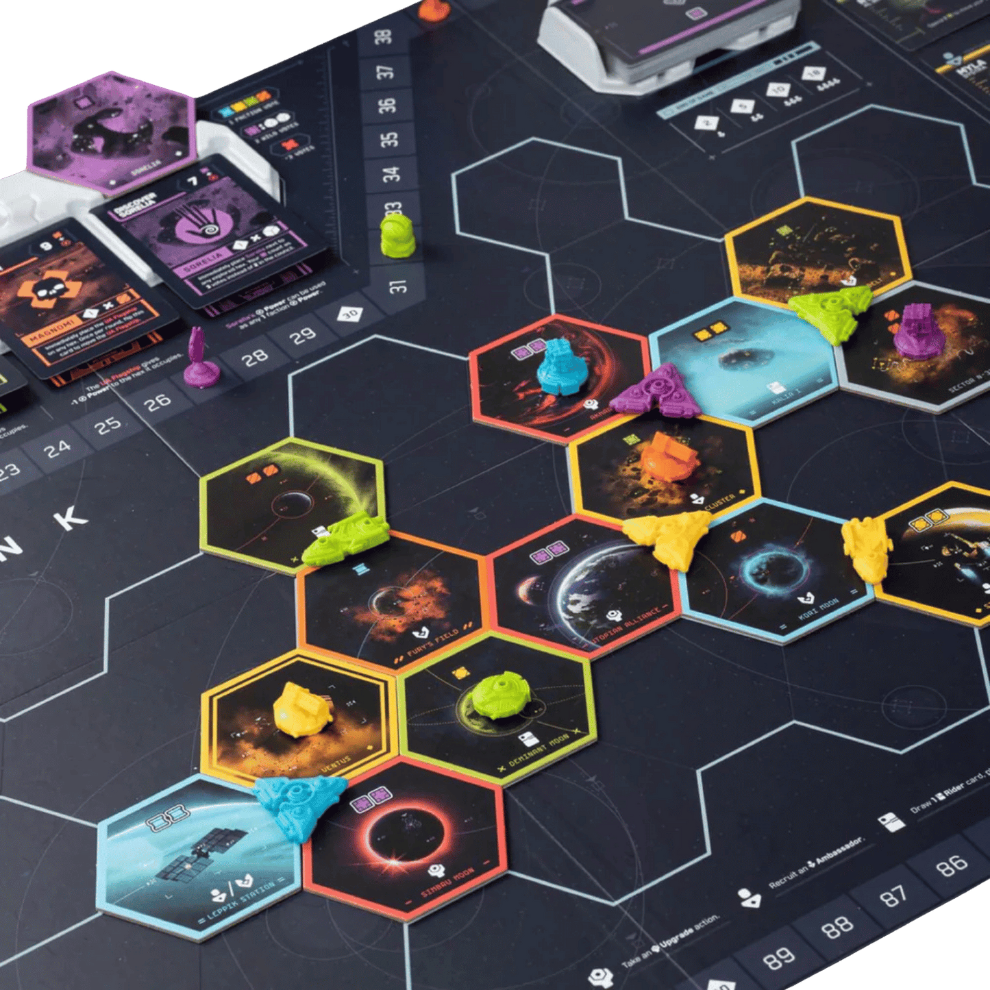 Close-up of a board game setup with hexagonal space tiles, colourful tokens, and game cards