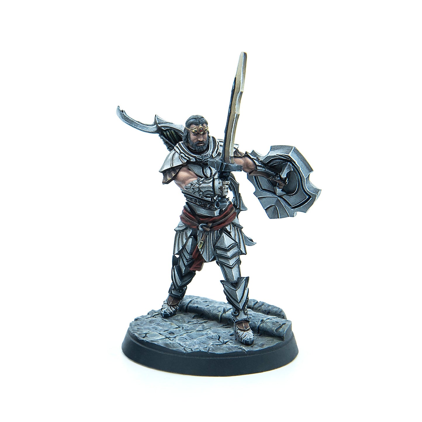 A detailed miniature of a bearded warrior in silver armor and gold circlet, wielding a raised sword and shield