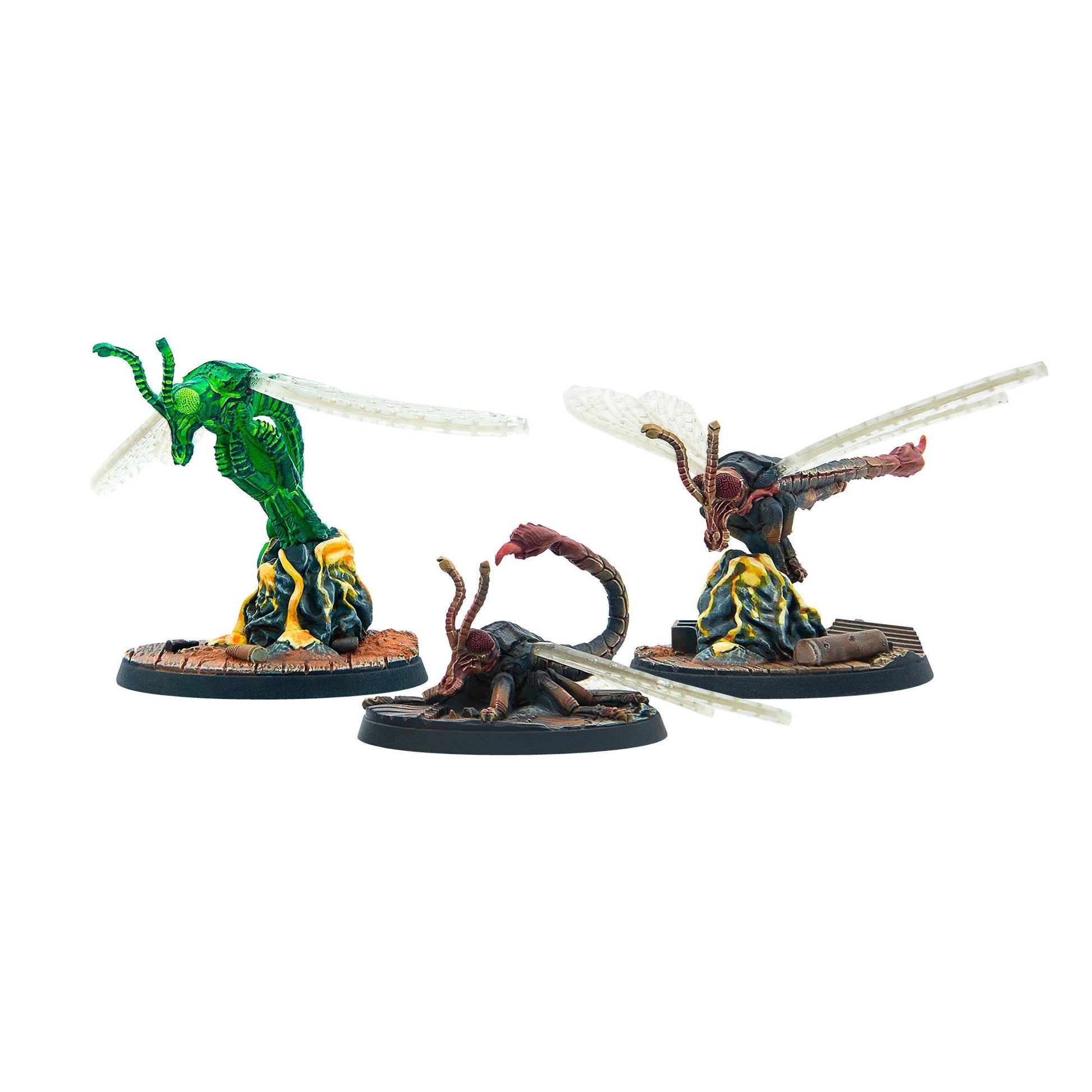 Three alien insect miniatures: green standing, two dark crouching, all with clear wings and glowing bases