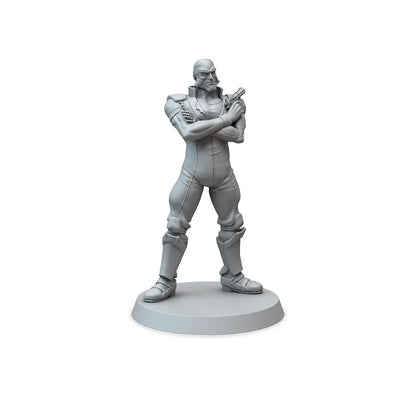 Unpainted miniature figure of a man with a goatee, wearing a jumpsuit, arms crossed, holding a pistol, on a round base