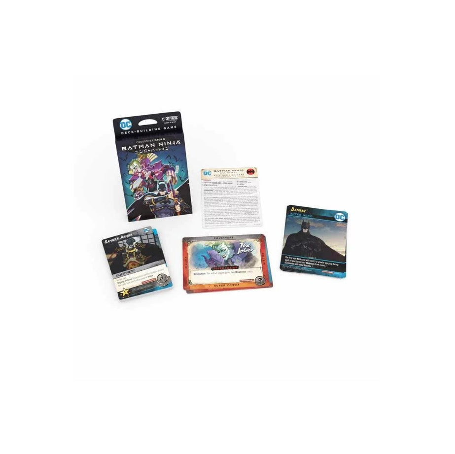 DC Deck-Building Game Batman Ninja Crossover Pack box with Samurai Armor, The Joker, Batman Super Hero, and rules cards displayed on a white surface