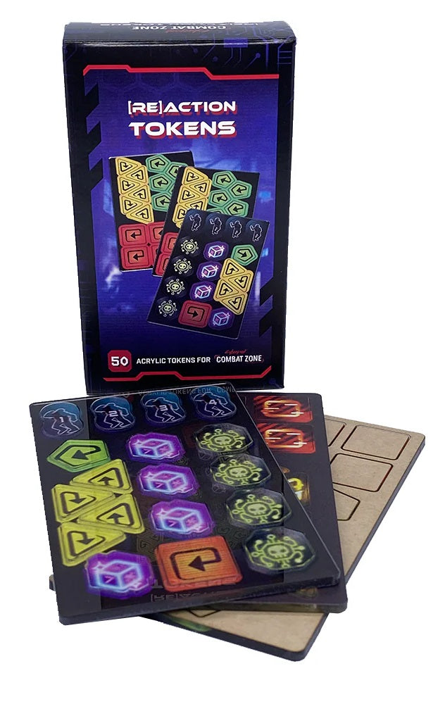 Dark box labeled "reaction TOKENS" with colorful acrylic game tokens showing arrows, skulls, cubes and figures, for Combat Zone