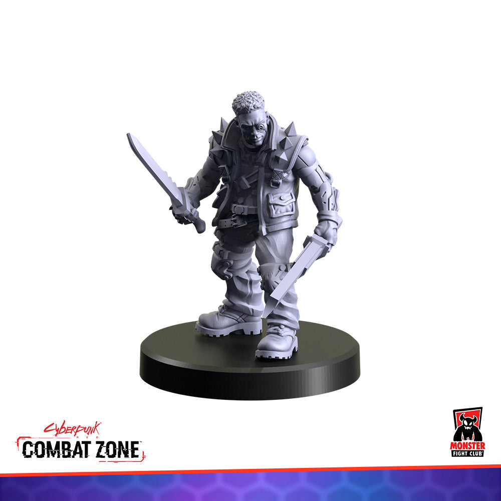 Unpainted male cyberpunk miniature in a spiked jacket, holding two bladed weapons, on a round base
