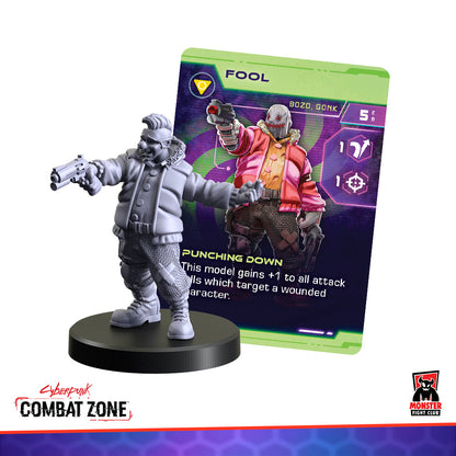 Grey Cyberpunk Combat Zone miniature with two pistols, next to a 'FOOL' card showing a masked character with a gun