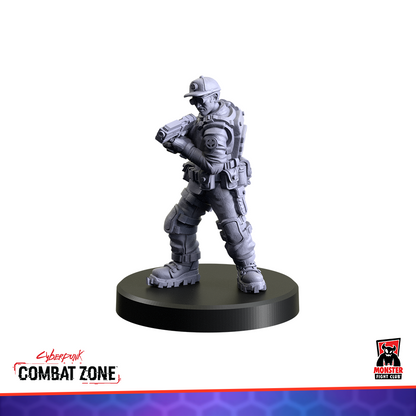 Unpainted grey cyberpunk miniature aims a pistol. Dressed in tactical gear, a cap, and kneepads