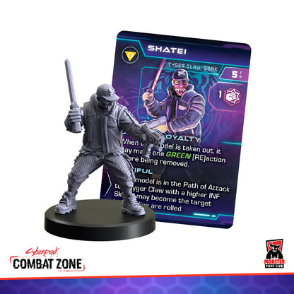Gray miniature of a combatant wielding a bat, posed next to a "SHATEI" game card with matching colorful character art