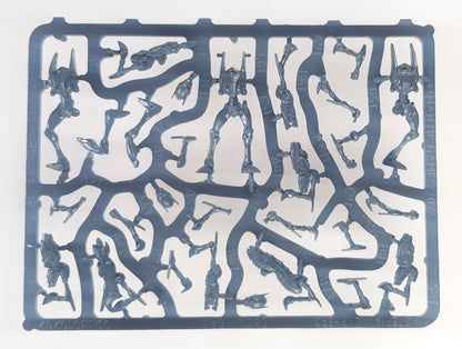 Grey plastic sprue holding unassembled sci-fi robot miniature parts, identified as Asterian Cyphers from Mantic Games
