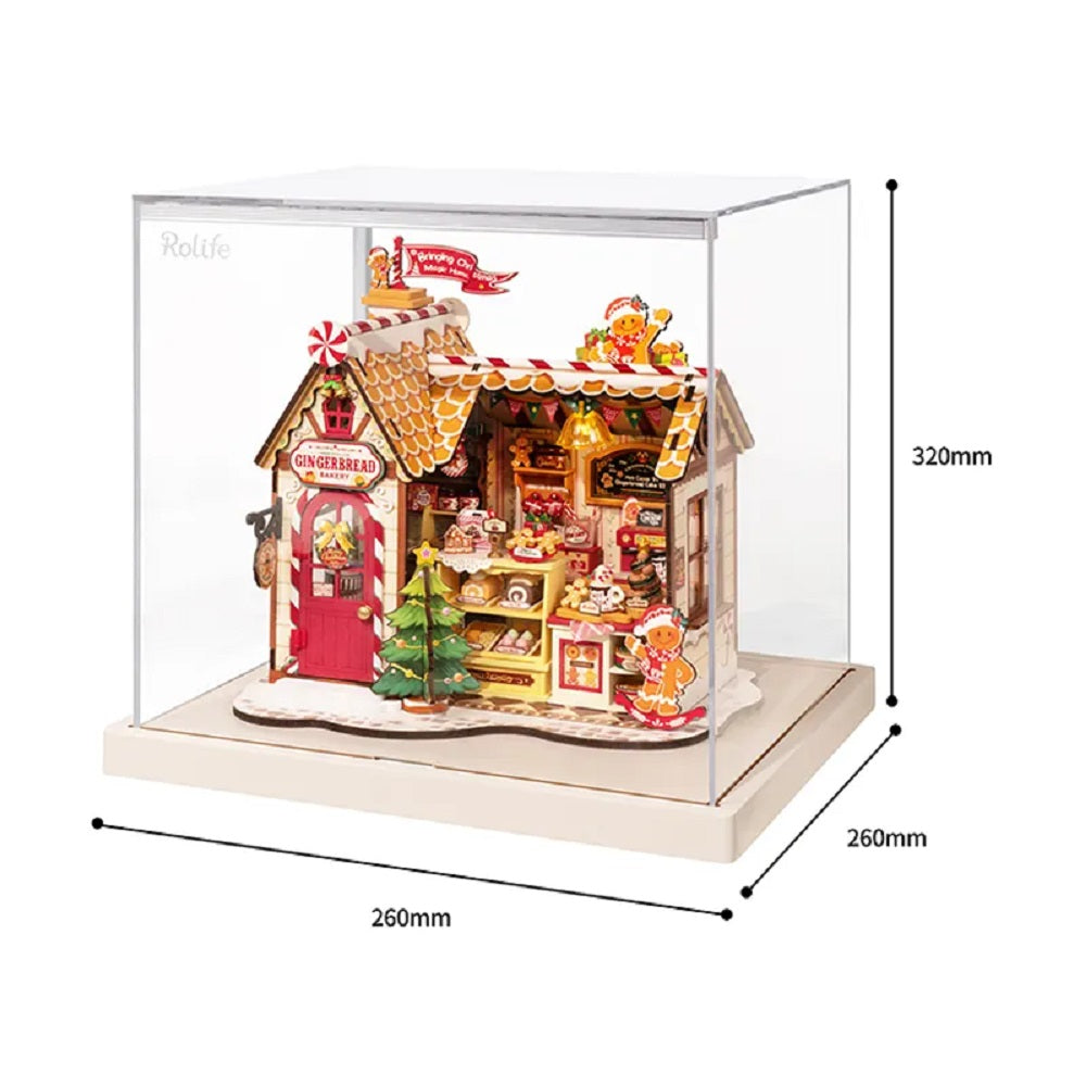 Detailed miniature gingerbread bakery model enclosed in an acrylic display case, with 320mm and 260mm dimensions shown