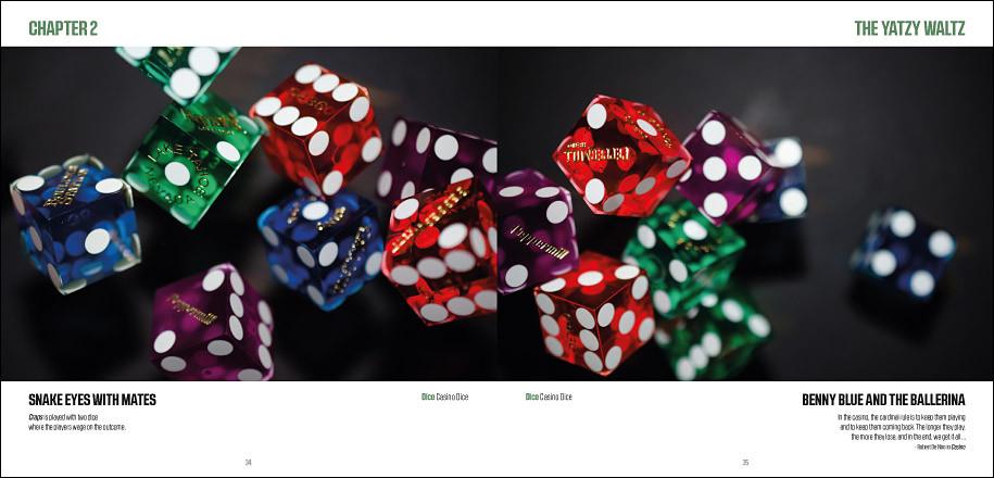 Numerous transparent casino dice in shades of blue, green, red, and purple with white pips are scattered across a dark surface