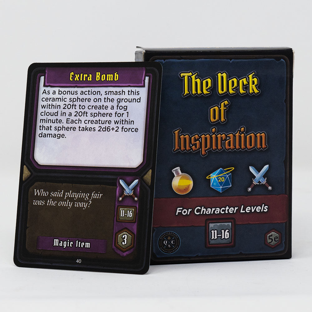 A game card titled &quot;Extra Bomb&quot; leans against its box, &quot;The Deck of Inspiration,&quot;,
