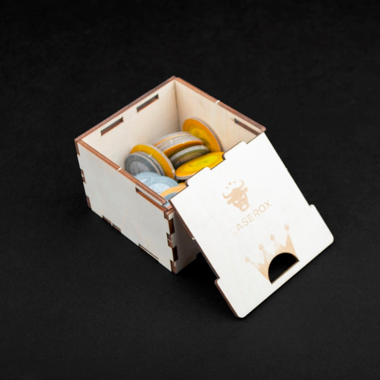 Close-up of wooden insert organizing Kingdomino tile stacks