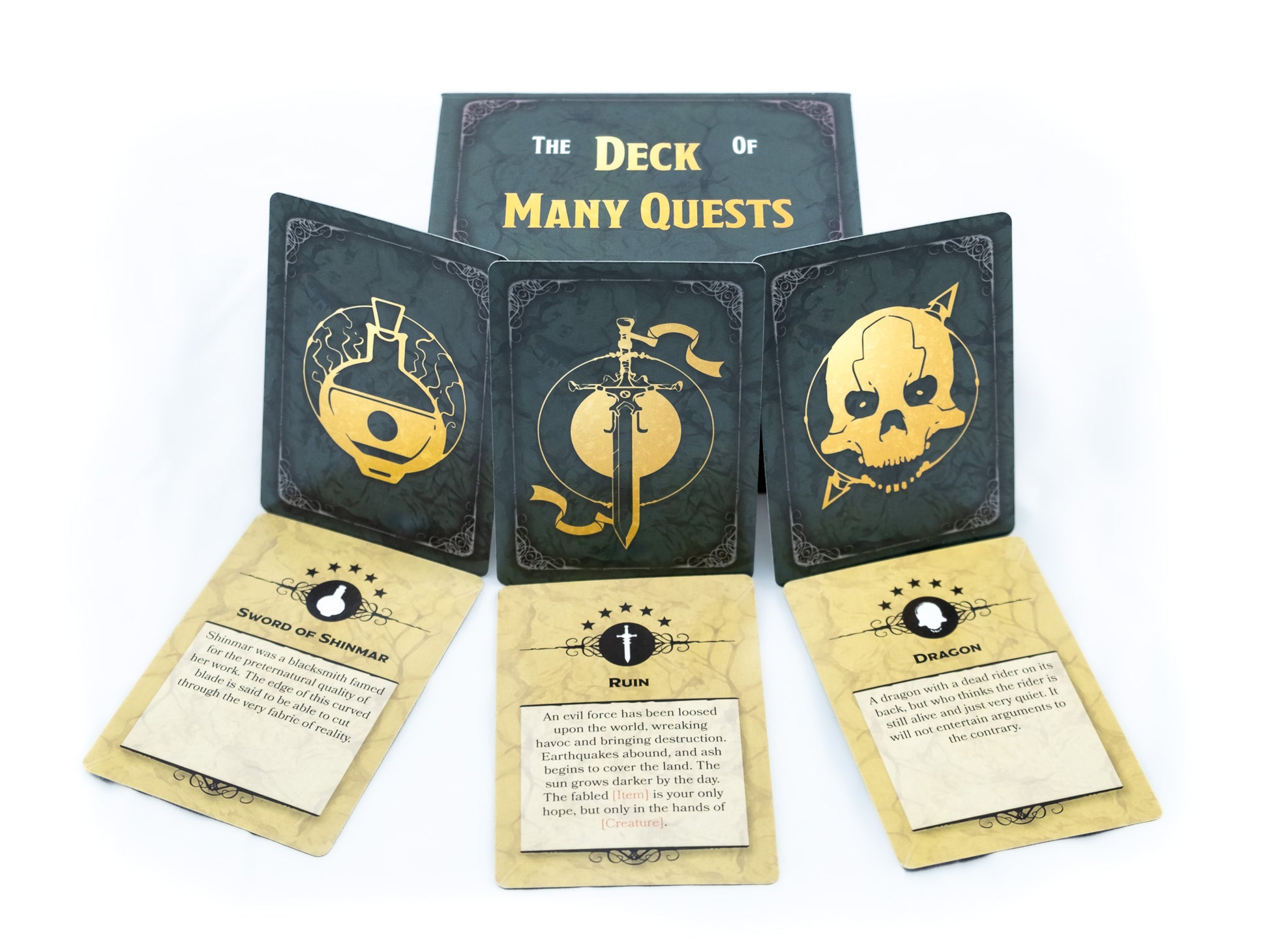 Fantasy quest cards from "The Deck of Many Quests" with golden icons: Sword, Ruin, and Dragon