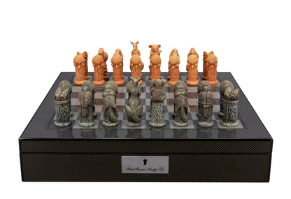Detailed animal-themed chess set with terracotta and bronze pieces on a dark checkered board, displayed on a storage box