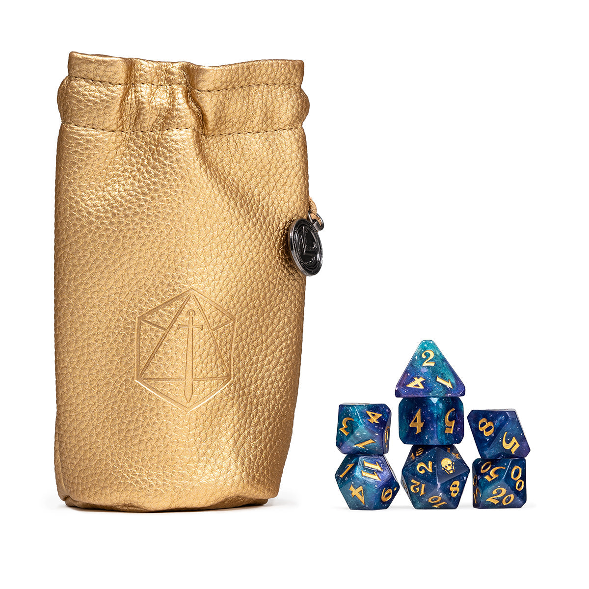 Gold leather dice pouch with a sword-in-d20 emblem, next to a stacked set of 7 blue-purple galaxy polyhedral RPG dice with gold numbers and a skull on the d12