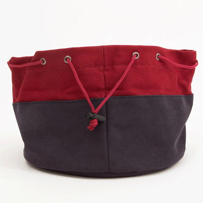 Red and charcoal drawstring bag with a black cord lock