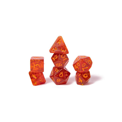 Seven translucent orange polyhedral dice with gold flecks, stacked on a white background