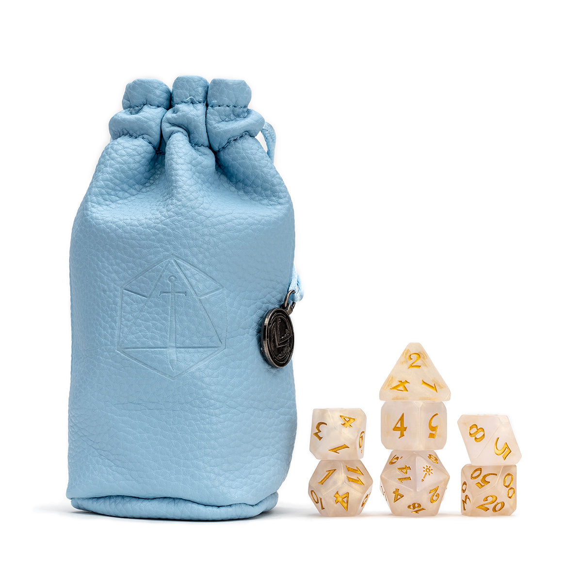 Textured light blue dice bag with symbol and metal charm, beside clear polyhedral dice with gold numbers