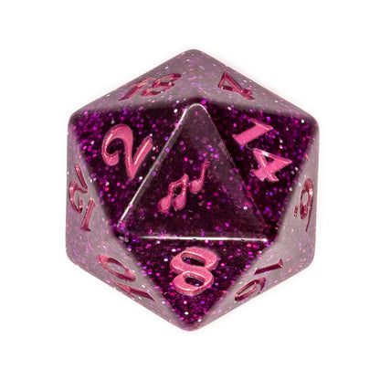 A purple glitter 20-sided die with pink numbers and musical notes