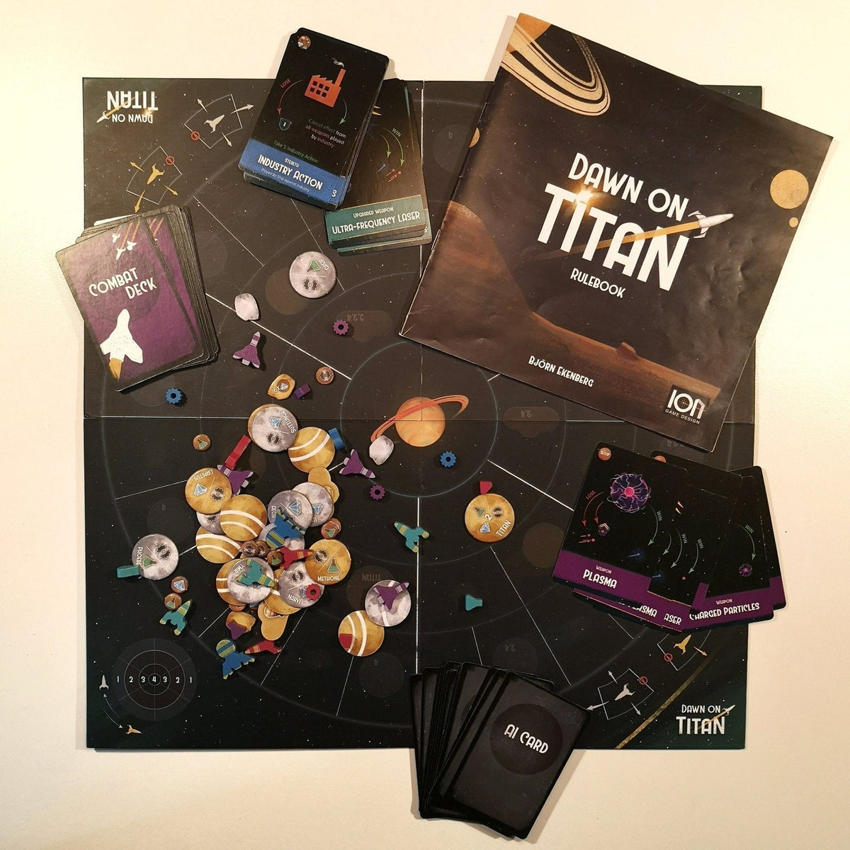 Close-up of a Dawn on Titan play area highlighting modular board tiles and player interaction during gameplay
