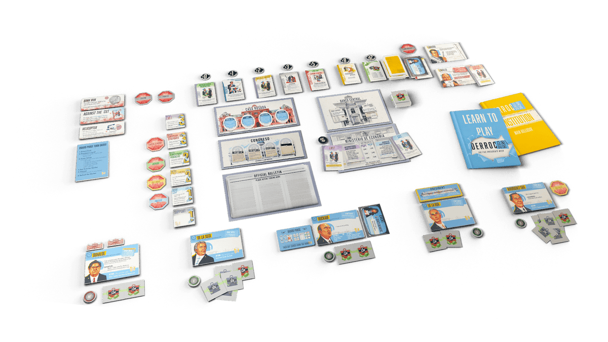 Overhead view of the Derrocar board game components spread across a green surface including rulebooks cards tokens and board pieces