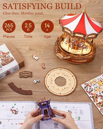 Hands assembling a wooden DIY carousel model kit; a finished, illuminated carousel, parts, and instructions are shown