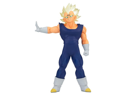 Majin Vegeta figure with 'M' on forehead, spiky blonde hair, blue suit. Left arm extended with open palm, right fist clenched