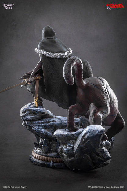 Gatherers Tavern 1/4 Scale Drizzt Do'Urden statue features a hooded character with a sword next to a dark panther on a snowy rock formation