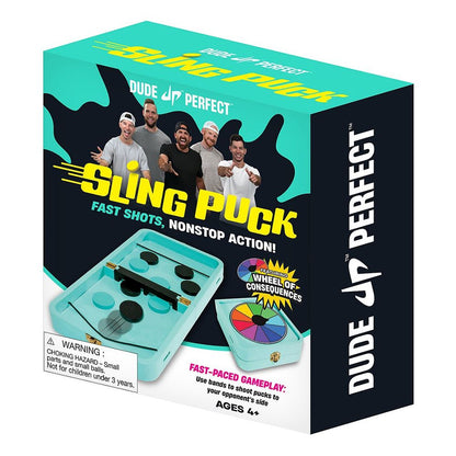 Dude Perfect Sling Puck game box featuring the members, a board with pucks and elastic bands for shooting, plus a colorful wheel