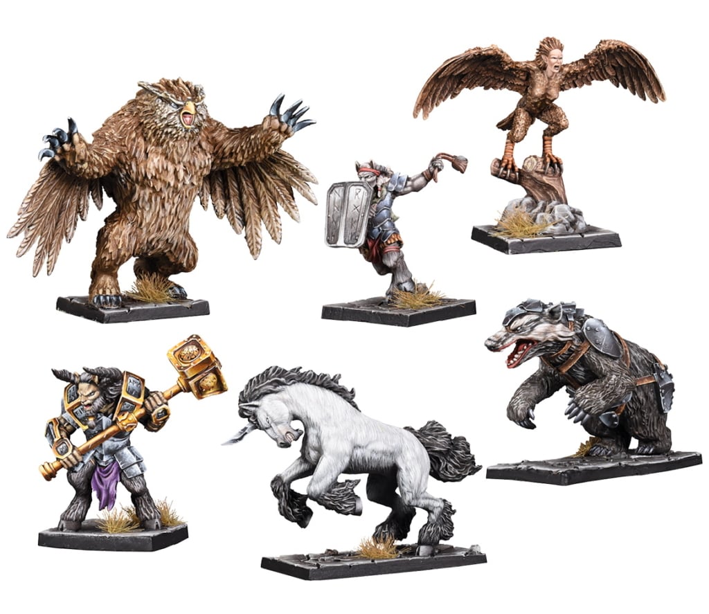 Six painted fantasy miniatures: brown owlbear, harpy on stump, armored satyr with shield, minotaur with golden hammer, rearing white unicorn, and armored bear