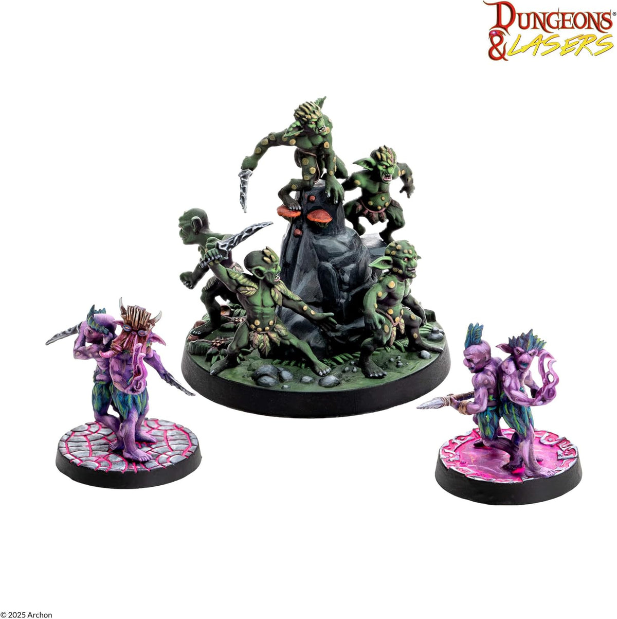 Fantasy miniatures: Green goblins on a rocky base, plus two purple conjoined figures holding weapons