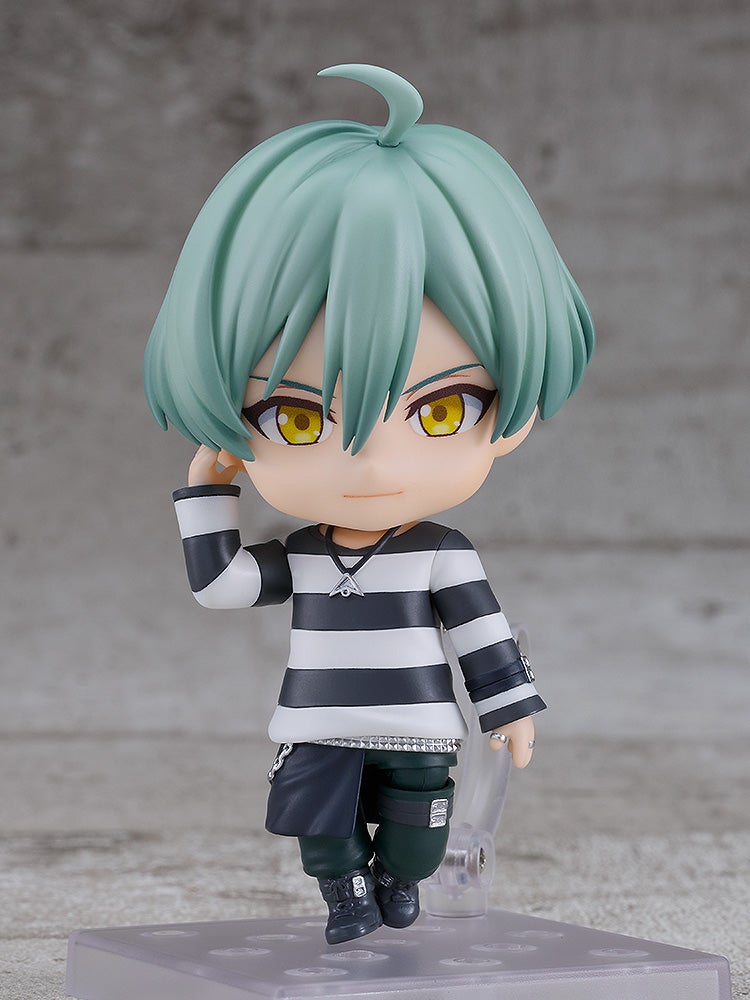 Alternate pose with crossed arms and serious face