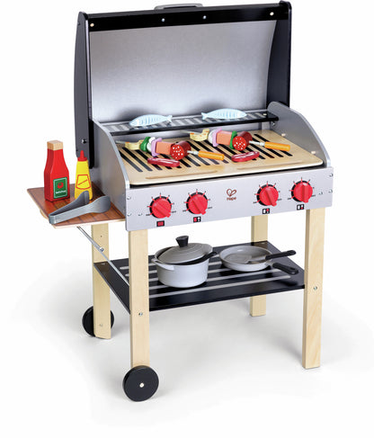Hape wooden toy grill with kebabs, fish, tongs, and condiments