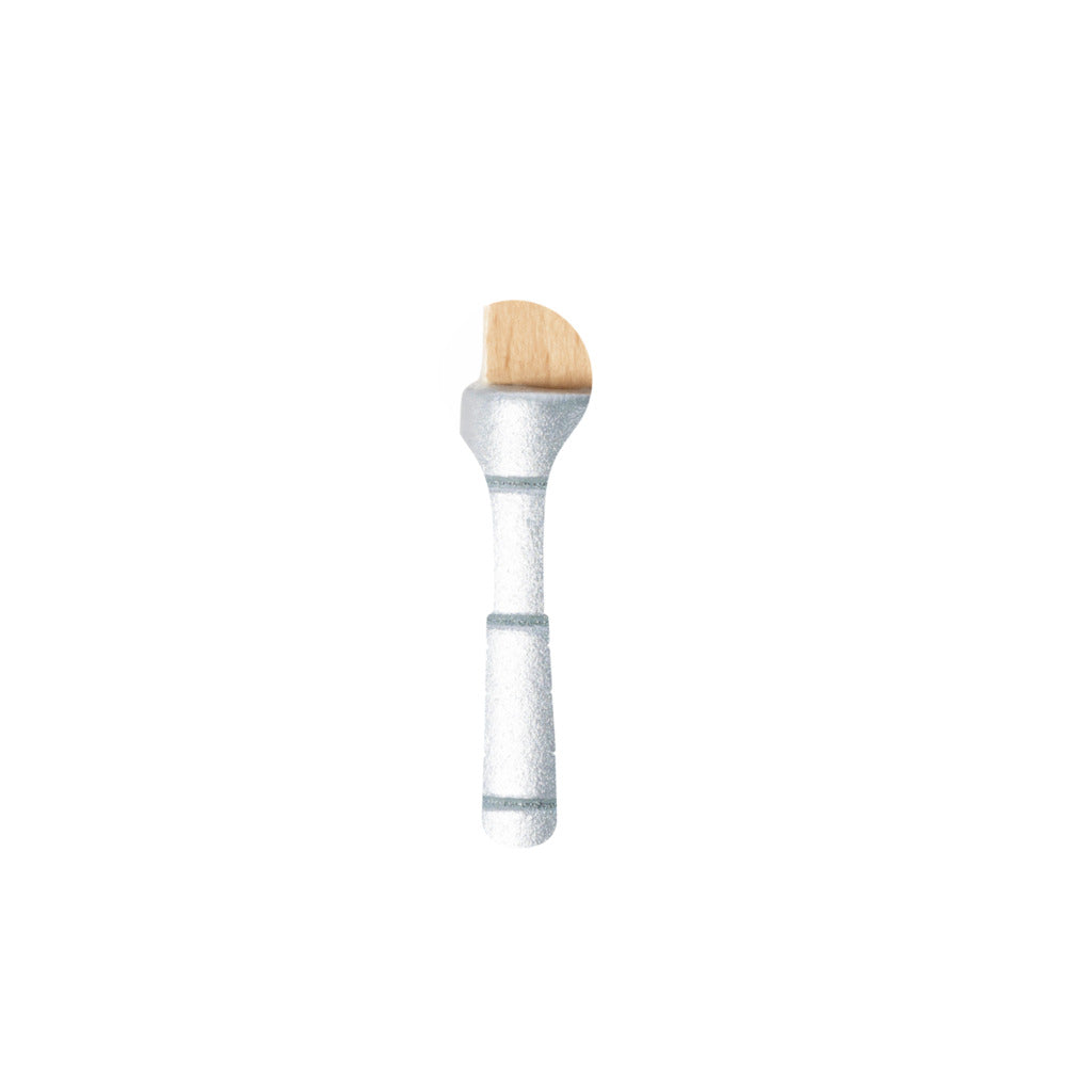 Small makeup brush with a light wood, semi-circular head and textured silver handle