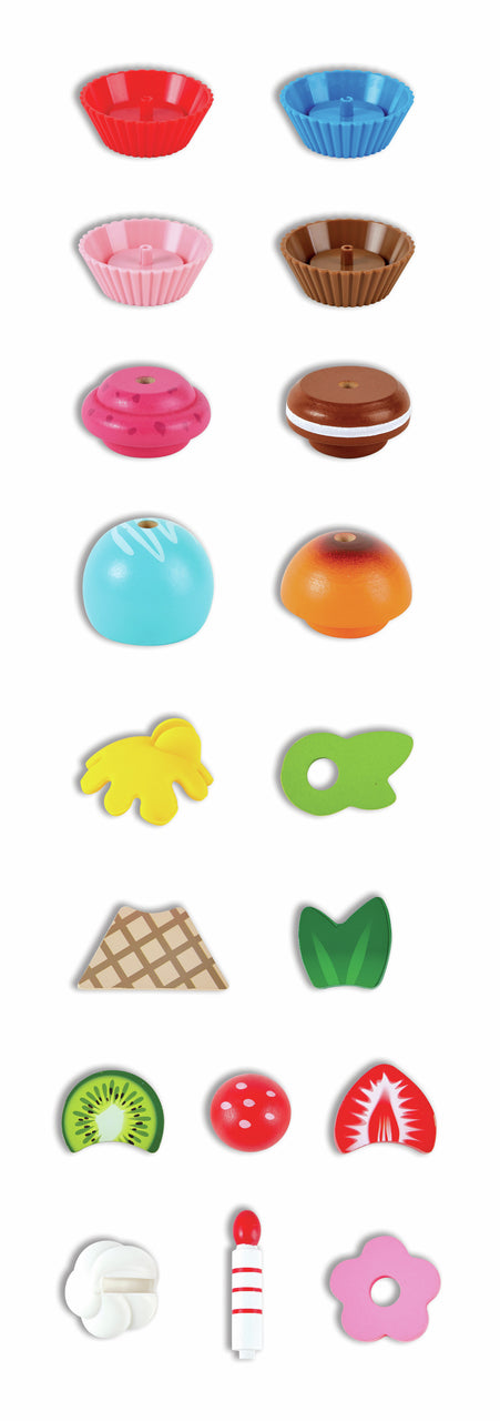 Assortment of colorful toy cupcake components, including liners, frosting, fruit slices, and a candle