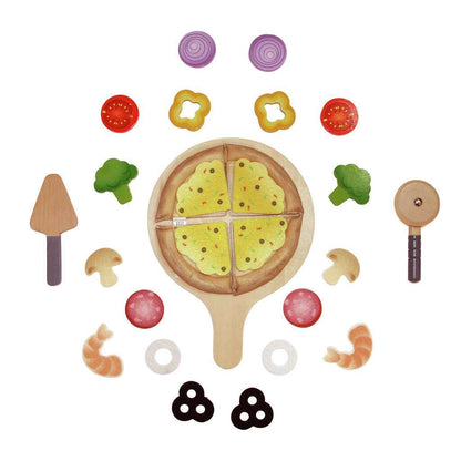A wooden play pizza set featuring a sliced pizza on a paddle, surrounded by various toy toppings, a spatula, and a pizza cutter