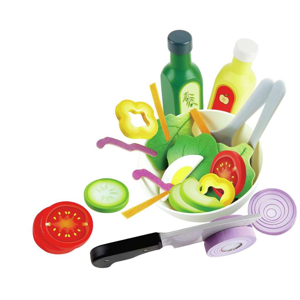 Wooden toy salad set with vegetables, dressing bottles, and a knife cutting an onion