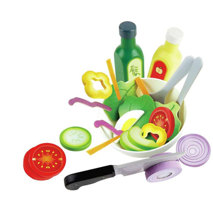 Wooden toy salad set with vegetables, dressing bottles, and a knife cutting an onion