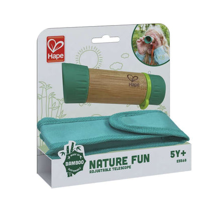 Hape Nature Fun adjustable telescope (bamboo/green) in packaging, displayed with a turquoise carrying case