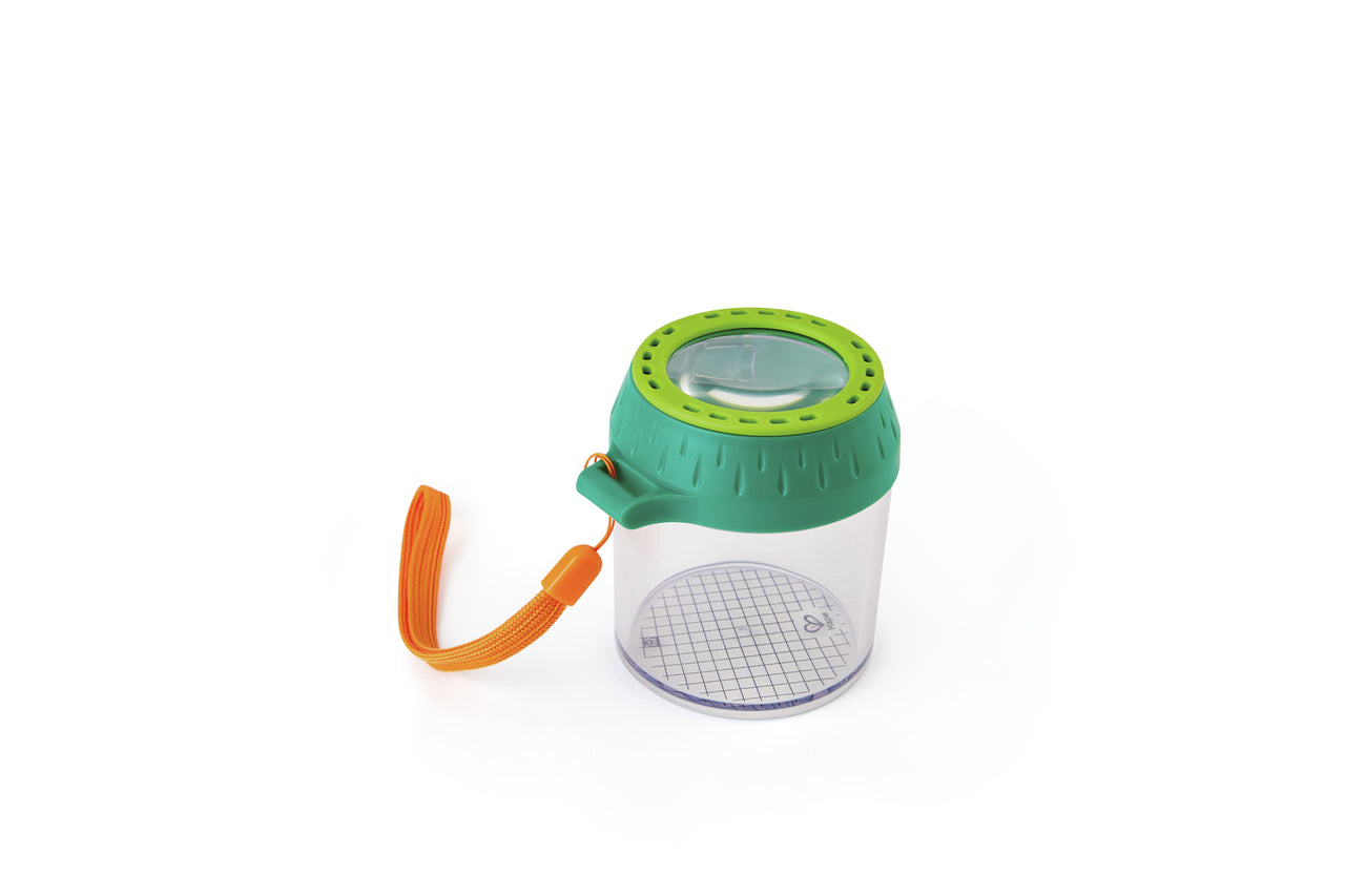 Green and orange bug viewer jar with a magnifying lid and measurement grid