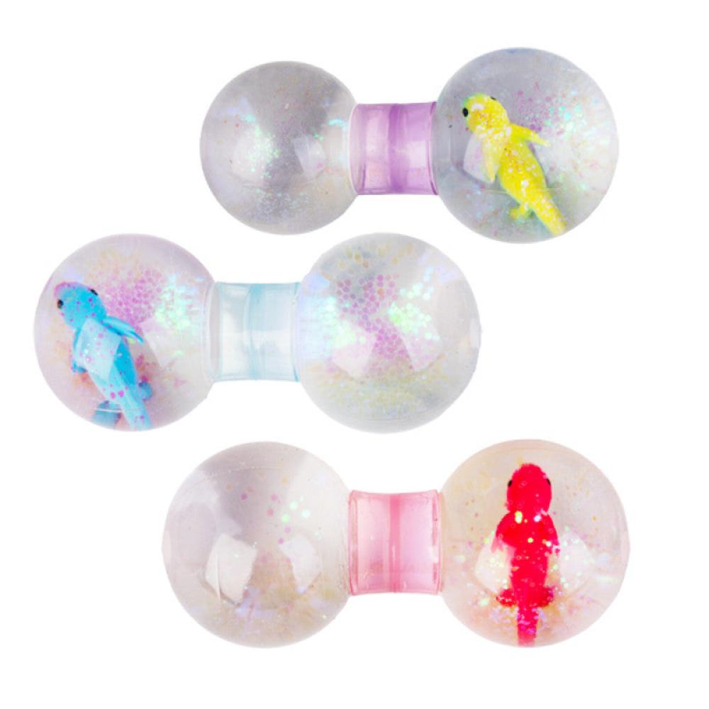 Three clear dumbbell-shaped liquid toys filled with glitter and colorful creature figurines