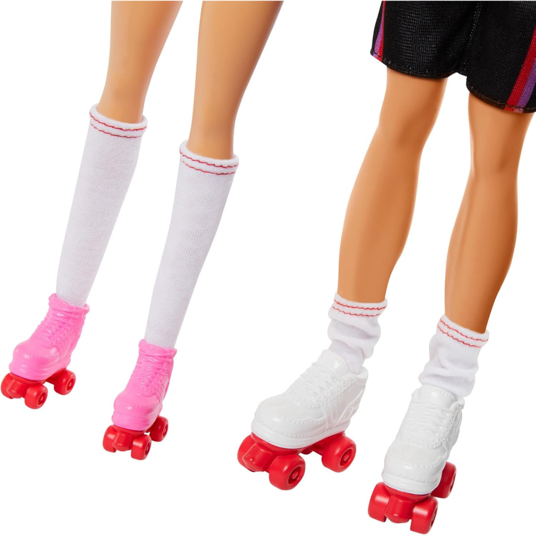 Close-up of two pairs of doll legs wearing white socks and roller skates; one in pink skates -  the other in white with black shorts