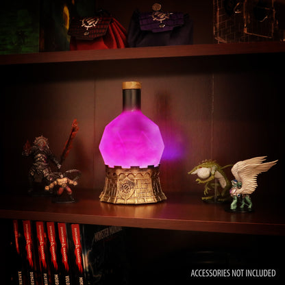 A D&D potion lamp, glowing purple, on a golden castle base, flanked by fantasy miniatures on a shelf