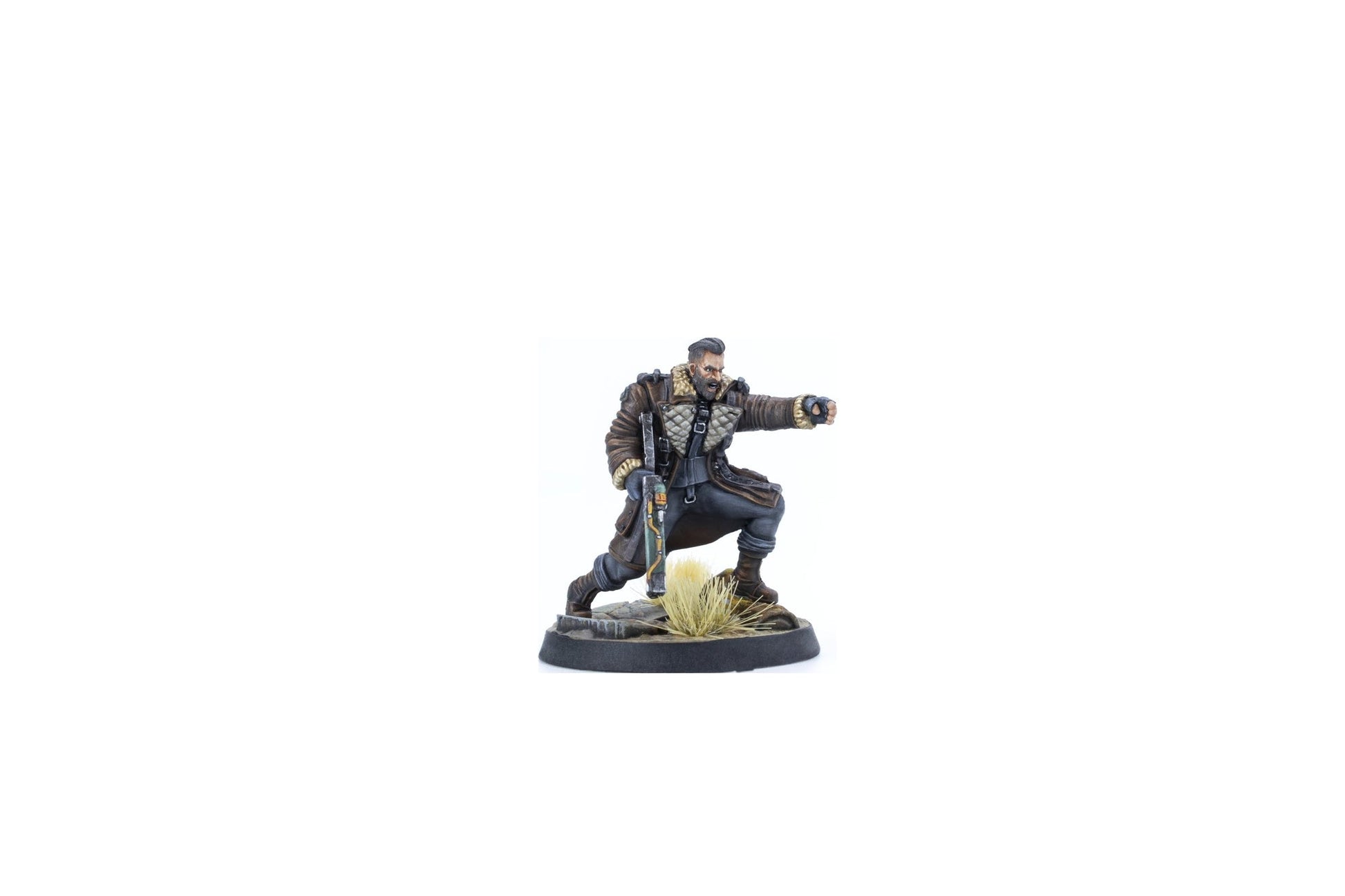 Painted miniature of a bearded man in a brown coat, crouching, holding a rifle, and pointing forward