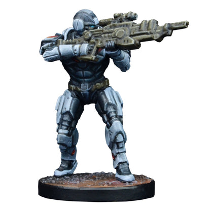 A miniature of a futuristic soldier in grey armor aiming a large rifle on a textured base.