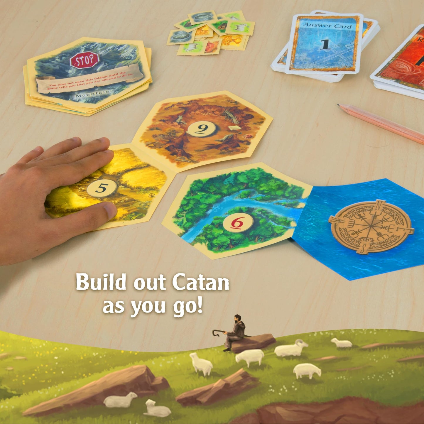A hand places hexagonal landscape tiles for Exit The Game - Adventures on Catan, with other tiles, resource tokens, and game cards visible on a wooden table