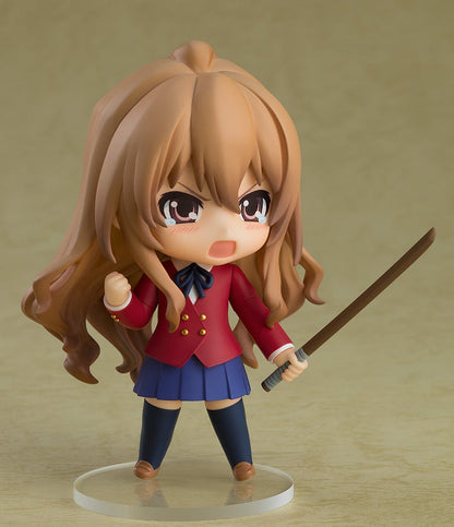 Figure of Taiga Aisaka in school uniform with a wooden sword