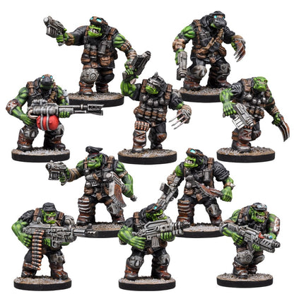 Nine detailed, green-skinned orc wargaming miniatures, heavily armed and armored in various combat poses
