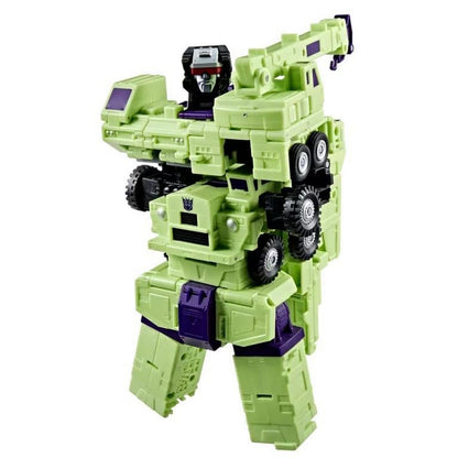 Green and purple Devastator Transformer action figure, comprised of construction vehicles, standing upright