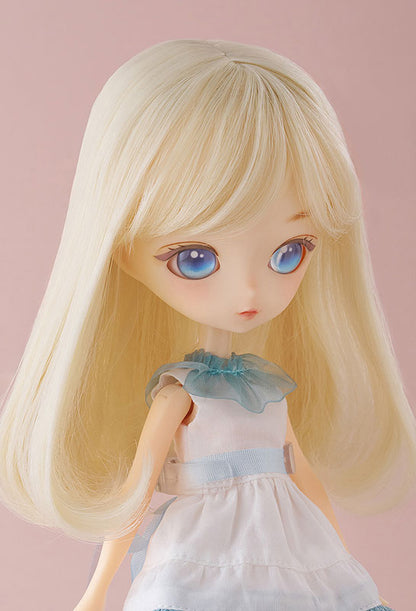 Curious doll holding a plush animal, showcasing her coordinated shoes and accessories